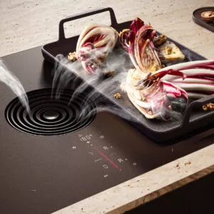 Innovatives Induktionskochfeld mit integriertem Dunstabzug direkt am Kochfeld. Dämpfe und Gerüche werden effektiv nach unten abgesaugt – für freie Sicht, leises Arbeiten und modernes Küchendesign ohne klassische Haube.